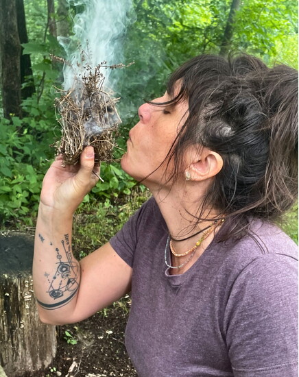 Making fire at the Wild Woman Retreat