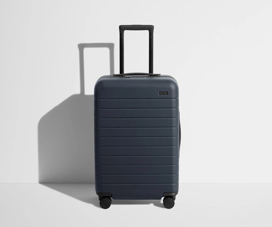 1. “My favorite suitcase is the Bigger Carry-on from Away. The more fun the color, the easier it is to identify your luggage!” $295.
