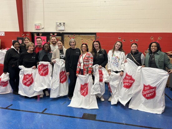 Salvation Army Christmas volunteers have fun working to make the season special for people in need.