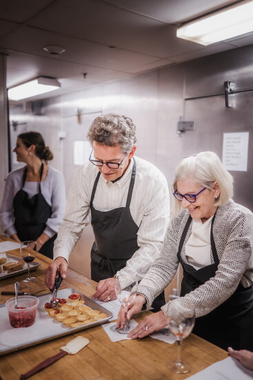 Members during a “Strawberry Fields of Flavor” cooking class with pairings in May.