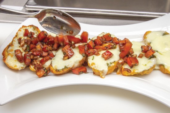 Spoon the Bruschetta Relish Over the Warm Melted Cheese