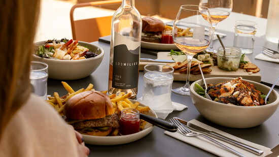 But don't snooze on the burger at Los Milics. Or Caesar's salad with shrimp is a wise option.
