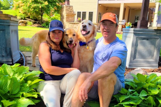 Tracy, her husband Eric, Lucky, and Jaxon pose for a family photo. 