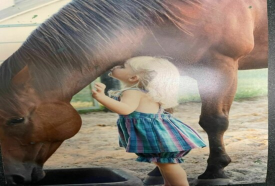 Samantha Dailey with family Quarter Horse Roy. Photo by Valerie Dailey. 