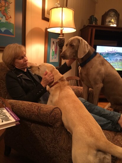 Diane Holland of Holland Pediatric Therapy  with her dogs, xxxx and xxxx