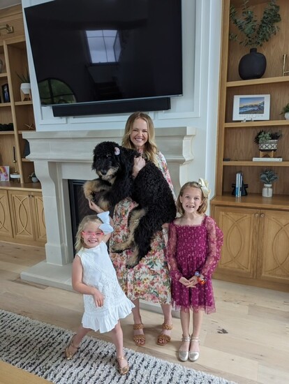 Dr. Heather Kierl of Craig and Streight Orthodonists with her daughters xxxx and xxxx and their dog, xxxxxxxx