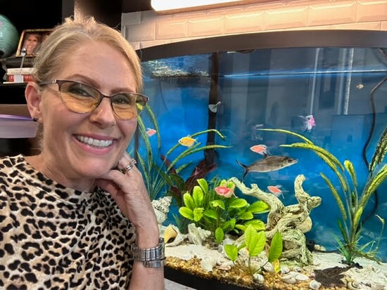 Kathy Griffith, Prime Realty, with her fish