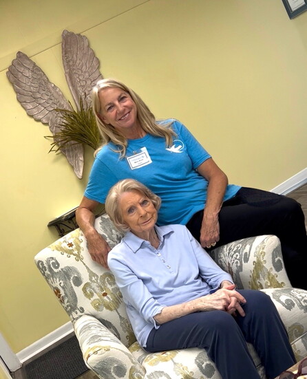 Longtime client Juanita Rhoads and her caregiver Maria Wood