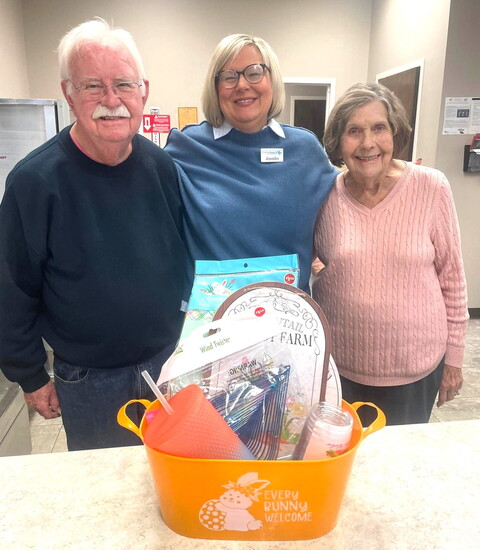 Client Care Manager Jennifer Hinds with Fairview Senior Center bingo winners Jermone Pearson and Myrl House