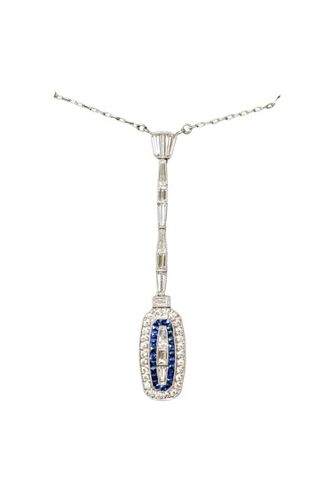 VINTAGE PENDANT NECKLACE Featuring old mine cut diamond baguettes and blue sapphires set in platinum. $10,000