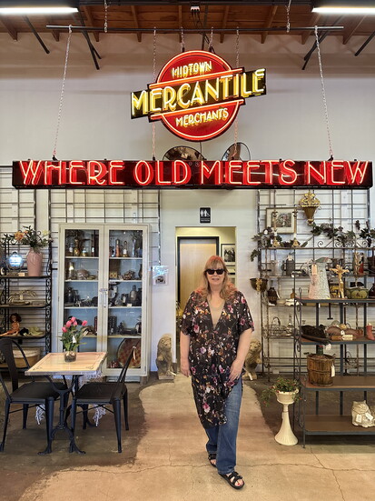 Owner Tami Mitchell surveys her domain briming with treasures