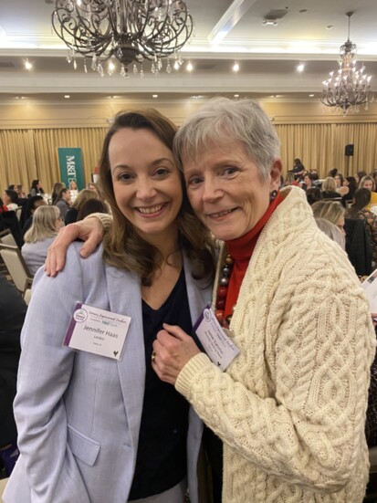 Domesic Abuse Survivor Jennifer Haas, with a board member,  brought several new work associates to the luncheon, with WGB board member Jane Lyons