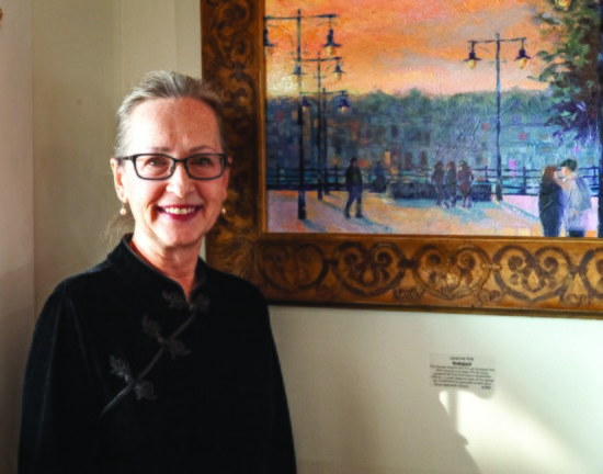 Leanne Fink with her Painting of Bucharest