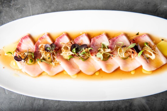 Hamachi crudo with pineapple, serrano pepper, crispy shallots and citrus-soy dressing from the raw bar at Foxtail on the Lake in Des Plaines