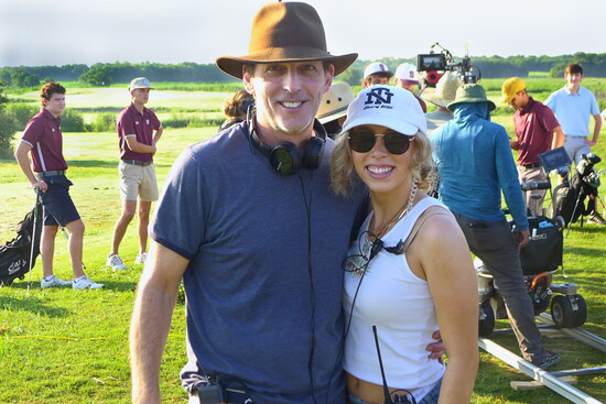 On set with his daughter Emma Parks, a New Trier graduate