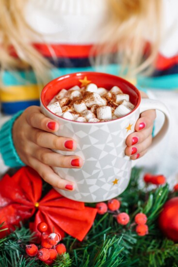 BOTTOM: Artisan hot chocolate topped with marshmallows are the perfect treat to stay warm this holiday season.