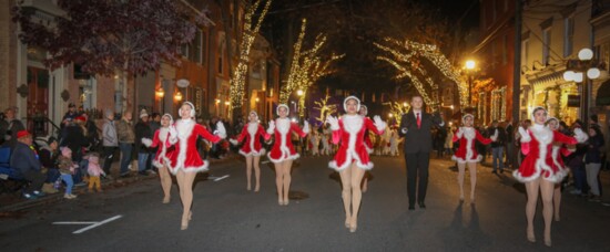 BOTTOM: Dance Unlimited holiday dancers at the Kris Kringle Parade in Downtown Frederick. (Photography by Bill Adkins)