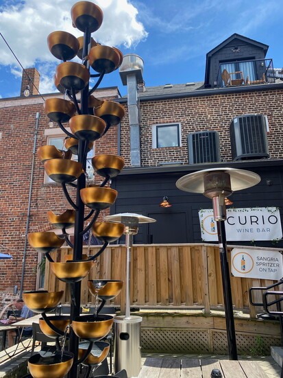 Outside at Curio Wine Bar and Tasting Room. Photo Credit: Victoria Demaire