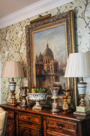 Old Paris and Mercury glass are center stage on early 19th century French buffet in the dining room.  The painting of Venice was found in Round Top, Texas.