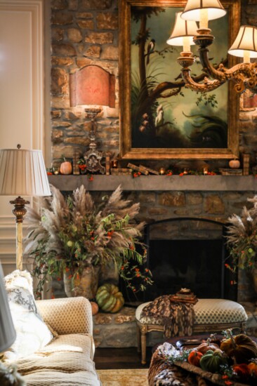 18th Century Italian alter sticks with Fortuny lampshades center stage on the mantle. The 18th century French Anduze pots on the hearth are staged for fall. 