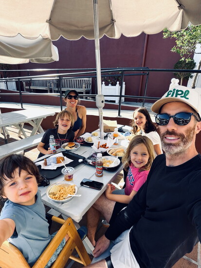 Victoria Thain Gioia and Greg Gioia with their four children