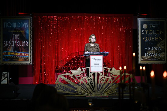 Fiona Davis giving a keynote address on her journey to becoming an author and the inspiration behind her novels.