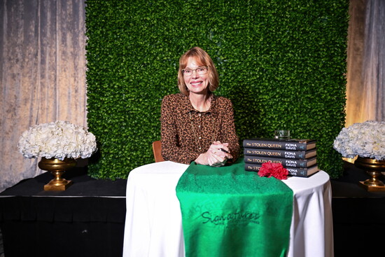 Davis with her latest novel, “The Stolen Queen.”