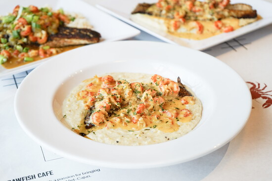 Crawfish Cafe, Blackened Redfish with Lemon Butter Crawfish & Grits. Photo by Marie Elgamal