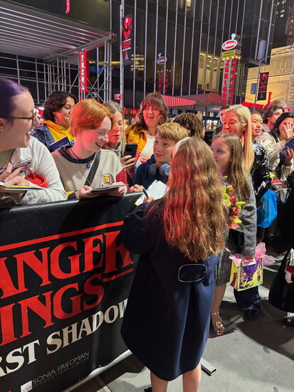 Lia signs autographs for fans outside the Marquis Theatre