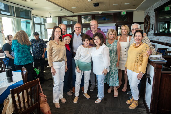 Community members gathered at Boat House on the Bay in support of Randy's fundraiser.