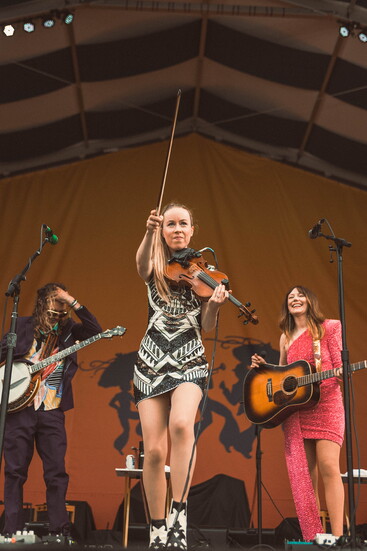 Performing with Molly Tuttle & Golden Highway at New Orleans Jazz & Heritage Festival Photo Credit: Eli Spotts