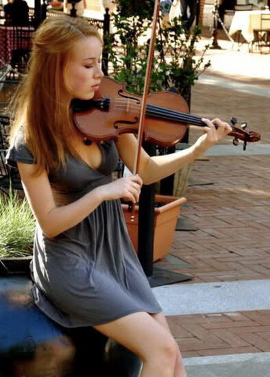 16 year old Bronwyn Keith-Hynes busking on the Downtown Mall in Charlottesville. Photo courtesy of Bronwyn Keith-Hynes. 
