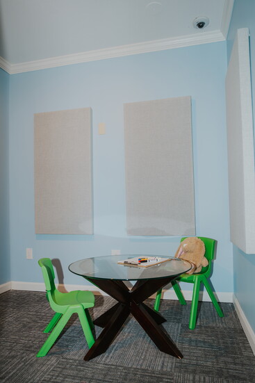 Small chairs, soft toys, and gentle colors; this interview room helps children feel safe and supported while sharing hard stories.