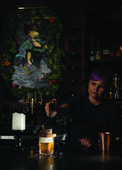Thea creates a signature cocktail called Into The Woods.