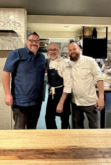 Jones seen here at Bos Taurus with former Head Chef Tom (center) and Executive Chef George Morris (right). Contributed photo