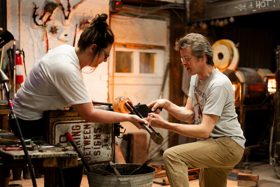 Gabby Kerson and Anson Parker working together at Raging Buffalo Glass. Photo Credit: Sanjay Suchak.