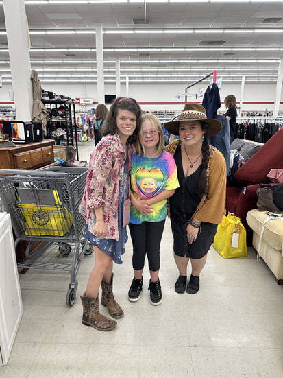 arc Thrift Store: Alexadra Birch, model Vallyn Weber, & Victoria Birch preparing for Styles Beyond Stereotypes Fashion Show