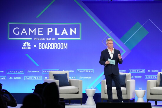 KC addressing an audience at a CNBC event. 