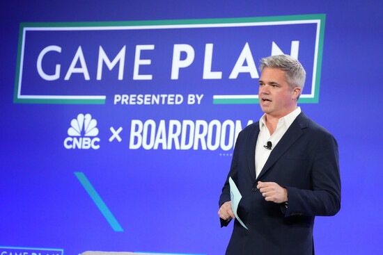 KC addressing an audience at a CNBC event. 