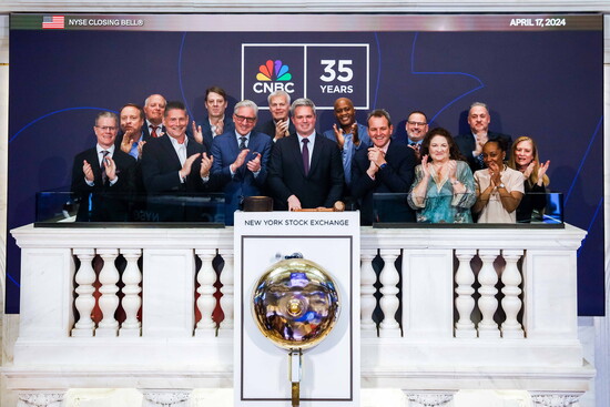 KC at a NYC Stock Exchange event. 