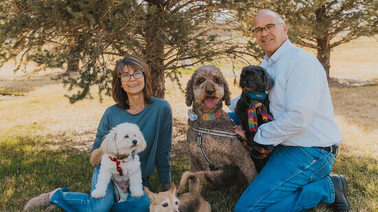 Dean and his wife, Cheryl with their four rescue dogs Skip, Taco Bella, Isabelle, and BG.