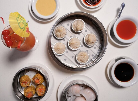 Soup dumplings, shrimp dumplings, and dipping sauce