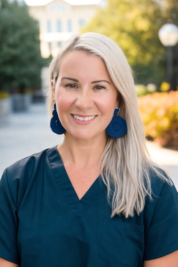 Dr. Lauren Mansell poses outside her Frankfort office.