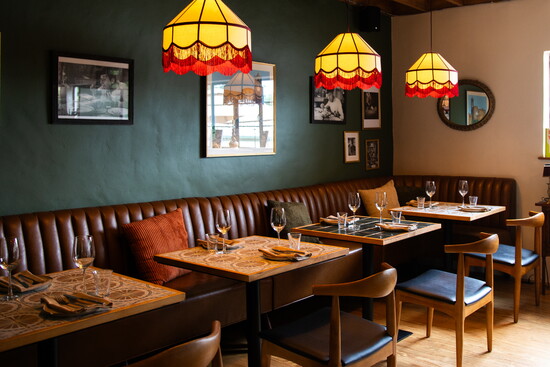 Inside Bottega Salaria, an intimate dining room creates an elevated and personal atmosphere.