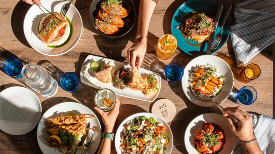 The Avli table blends modern Greek small plates and mains with inventive twists. (Photo credit Mac Yellek)