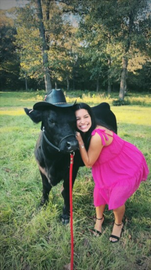 Meredith Cox with her calf. 