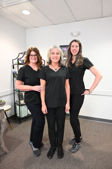 Patricia Vreeland with Rebecca Place, licensed medical massage therapist, and owner Holly Lange 