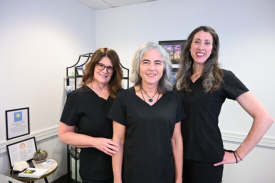 Patricia Vreeland with Rebecca Place, licensed medical massage therapist, and owner Holly Lange 
