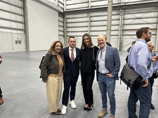 American Magic's Tyson Lamond (2nd from left) with Pensacola City Lifestyle's Suzanne Pope, Sydney Steffen, and Will Estell