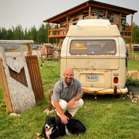 Dr. Boyer, on vacay in Victor, Idaho! With him is Niko, a collie-shepherd mix who lives on the property and watches over the sheep, horses and chickens.